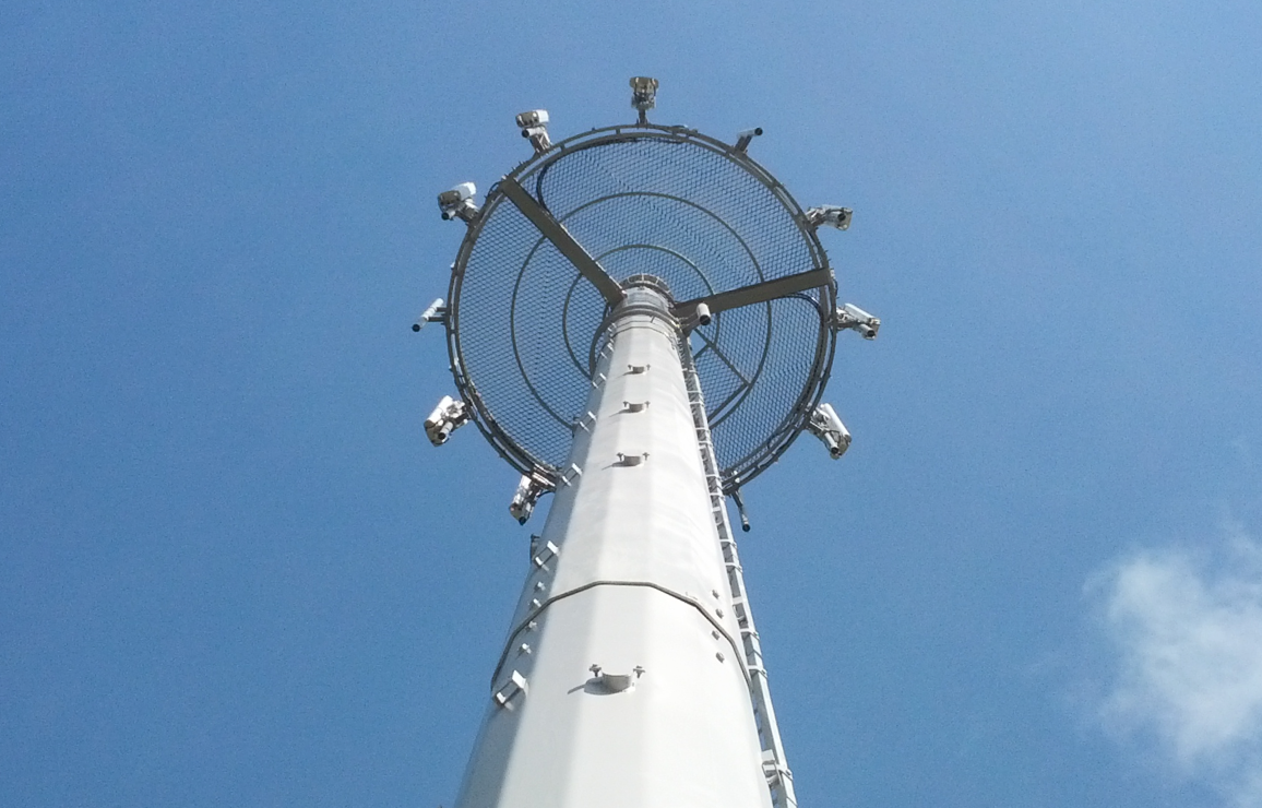 tower with CCTV cameras seen from below